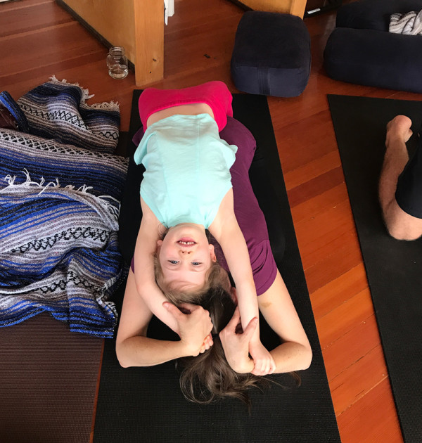 child and mother yoga